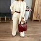 Elegante cardigan lungo, top e pantaloni, set di 3 pezzi