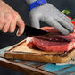 🧤 SCONTO DEL 50% IN QUESTO MOMENTO! 🥩 Guanto in rete di acciaio inossidabile – Massimo livello di protezione contro i tagli (A9) – Perfetto per macellai e chef – Niente più incidenti con i coltelli! 🔪🚫