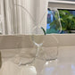 Vaso decorativo trasparente ispirato alle farfall