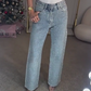 Jeans a gamba tesa impreziositi da stras