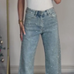 Jeans a gamba tesa impreziositi da stras