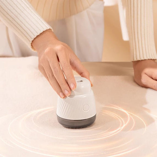 Tagliapelucchi portatile compatto per vestiti e mobil