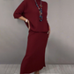 Elegante set composto da maglione lavorato a maglia e gonna mid