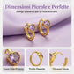 Orecchini huggie a cerchio dorati con zircone a cuore