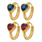 Orecchini huggie a cerchio dorati con zircone a cuore
