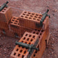 Clip regolabili per la linea Brick in PA6 e guide di scorrimento estese